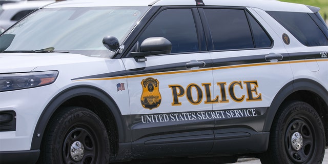 A U.S. Secret Service Uniformed Division police car is parked in front of the White House in Washington, April 21, 2022.