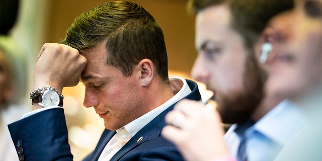 Rep. Madison Cawthorn, R-N.C., watches results from the North Carolina primary election with staff, volunteers, family and friends at his campaign headquarters on Tuesday, May 17, 2022, in Hendersonville, N.C.