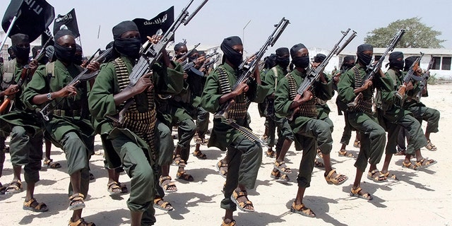 Hundreds of newly trained al-Shabab fighters perform military exercises near Mogadishu, in Somalia, in 2011.