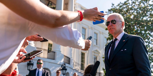 President Joe Biden speaks to members of the media on the South Lawn of the White House in Washington, Monday, May 30, 2022, after returning from Wilmington, Del.