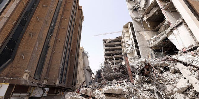 In this photo released by official website of the office of Iranian Senior Vice-President, on Friday, May 27, 2022, ruins of a tower at under construction 10-story Metropol Building remains after it collapsed on Monday, in the southwestern city of Abadan, Iran.