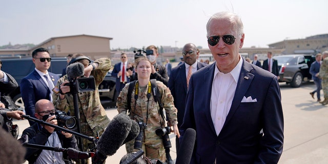 U.S. President Joe Biden speaks before boarding Air Force One for a trip to Japan at Osan Air Base, Sunday, May 22, 2022, in Pyeongtaek, South Korea. (AP Photo/Evan Vucci)