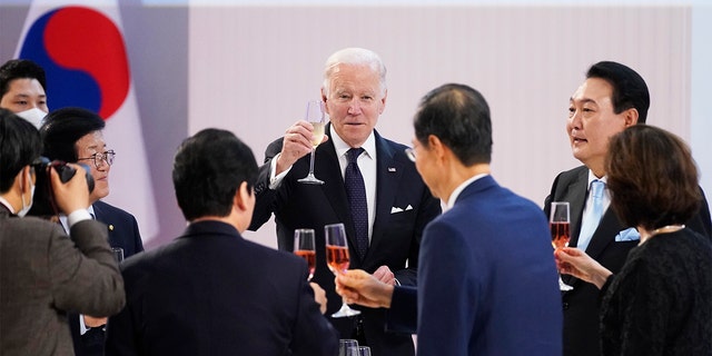 President Biden, center, has a toast with South Korean President Yoon Suk Yeol, second right, at a state dinner at the National Museum of Korea, Saturday, May 21, 2022, in Seoul. 