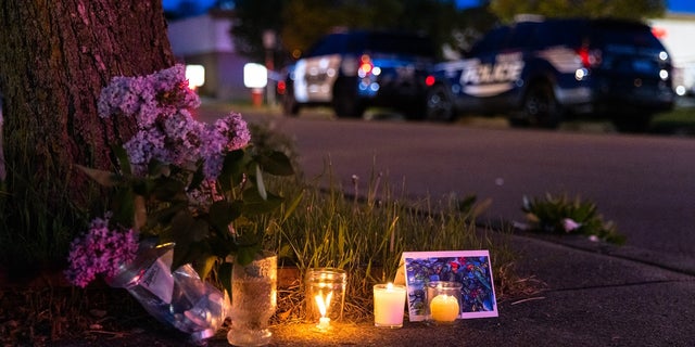BUFFALO, NY - MAY 14: A small vigil set up across the street from a Tops grocery store on Jefferson Avenue in Buffalo, where a heavily armed 18-year-old White man entered the store in a predominantly Black neighborhood and shot 13 people, killing ten, Saturday, May 14, 2022. 