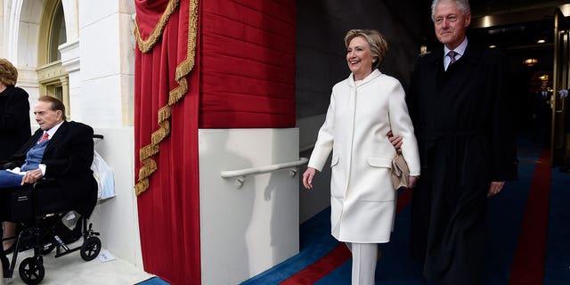 Former U.S. President Bill Clinton and First Lady Hillary Clinton arrive for the Presidential Inauguration of Trump at the U.S. Capitol in Washington, D.C., U.S., January 20, 2017. REUTERS/Saul Loeb/Pool