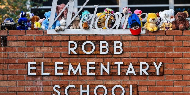 Mementos decorate a makeshift memorial for the shooting victims outside Robb Elementary School in Uvalde, Texas, on May 28, 2022. 