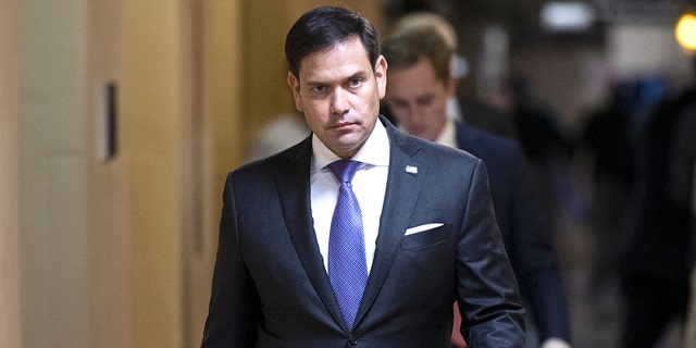 Sen. Marco Rubio, R-Fla., walks to the Senate subway after a vote in the U.S. Capitol on Wednesday, May 26, 2021. 