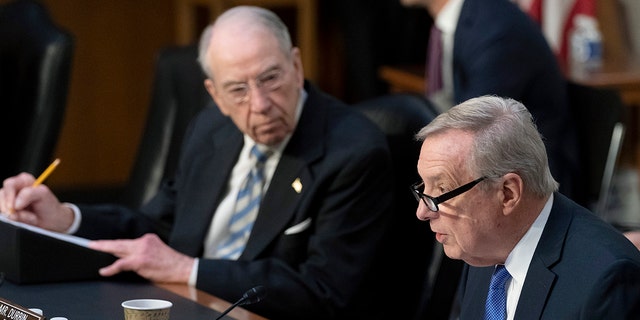 Sen. Chuck Grassley, R-Iowa, the ranking member of the Senate Judiciary Committee, left, listens as Sen. Dick Durbin, D-Ill., chairman of the Senate Judiciary Committee, speaks during Supreme Court nominee Judge Ketanji Brown Jackson's confirmation hearing before the Senate Judiciary Committee on Capitol Hill in Washington March 23, 2022.
