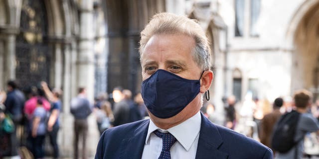 Christopher Steele, a former British spy who wrote a 2016 dossier about alleged links between Donald Trump and Vladimir Putin, leaves the High Court in London following a hearing in the libel case brought against him by Russian businessman Aleksej Gubarev. 