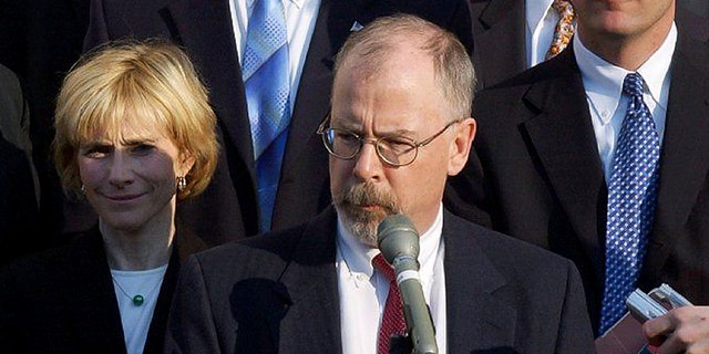 U.S. Attorney John Durham, center, outside federal court in New Haven, Conn., after the sentencing of former Gov. John Rowland. 