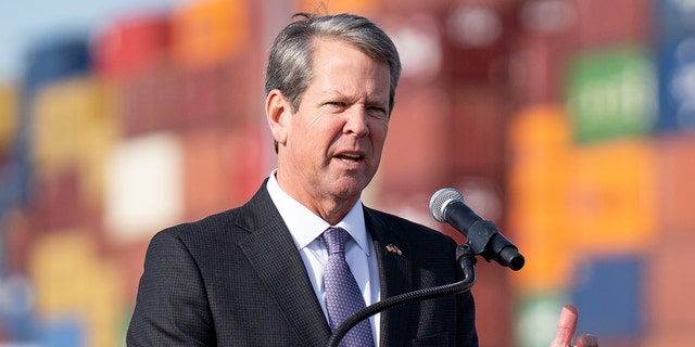 Georgia Gov. Brian Kemp speaks during a ribbon-cutting ceremony for the Mason Mega Rail Station at the Garden City Port Terminal Nov. 12, 2021, in Garden City, Ga.