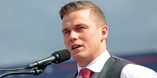 FILE - U.S. Rep. Madison Cawthorn, R-N.C., speaks to the crowd before former President Donald Trump takes the stage at a rally, April 9, 2022, in Selma, N.C. (AP Photo/Chris Seward, File)