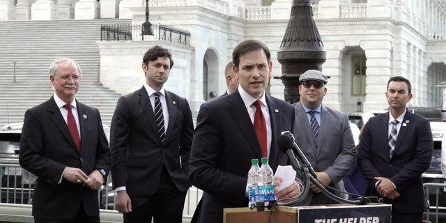 Sen. Marco Rubio speaks in front of the Capitol building about legislation that would help first responders purchase homes.