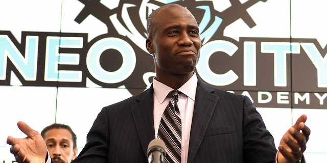 Florida Surgeon General Joseph Ladapo speaks during a press conference at Neo City Academy in Kissimmee, Florida in September 2021.