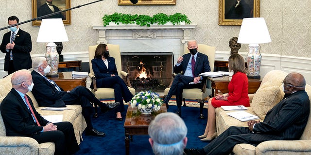 U.S. President Joe Biden and Vice President Kamala Harris meet with House Democratic leaders, including  (L-R) Rep. Peter DeFazio (D-WA), Majority Leader Steny Hoyer (D-MD), Speaker of the House Nancy Pelosi (D-CA), Majority Whip James Clyburn (D-SC) and other committee chairs to discuss the coronavirus relief legislation in the Oval Office at the White House February 5, 2021 in Washington, DC.