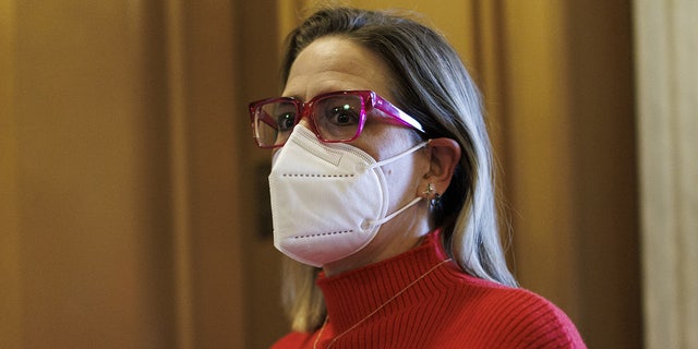 Senator Kyrsten Sinema, a Democrat from Arizona, arrives to the U.S. Capitol in Washington, D.C., U.S., on Wednesday, Jan. 19, 2022. Senate Democrats edged closer to handing the White House another defeat as the chamber took up voting-rights legislation with extraordinarily long odds in the evenly divided chamber.