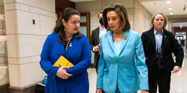 House Speaker Nancy Pelosi walks with Ukraine's ambassador to the United States, Oksana Markarova, after watching the video address by Ukrainian President Volodymyr Zelenskyy to Congress at the Capitol, March 16, 2022.