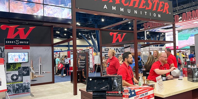 Different booths are shown on the exhibit floor of the 2022 NRA convention in Houston.
