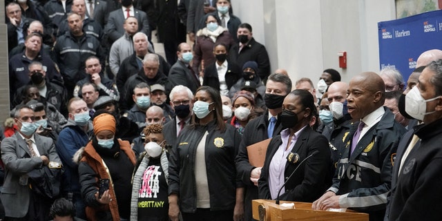 New York City Mayor Eric Adams speaks addresses the press about the scene where NYPD officers were shot while responding to a domestic violence call in the Harlem neighborhood of New York City, Jan. 21, 2022.