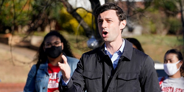 Sen. Jon Ossoff, shown campaigning on Dec. 22, 2020, is pushing for $270 million in funding to help police deal with people who have PTSD and TBI. (AP Photo/John Bazemore)