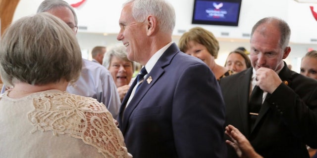 Former Vice President Mike Pence meets with congregants gathered Lakewood Baptist Church in Rock Hill, South Carolina, for a National Day of Prayer service, on May 5, 2022