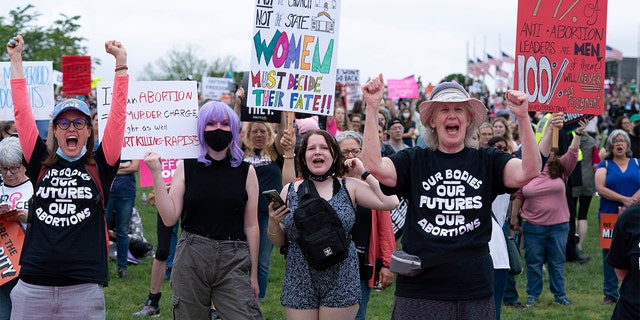 Pro-choice activists rally at the Washington Monument before a march to the U.S. Supreme Court in Washington, May 14, 2022. 