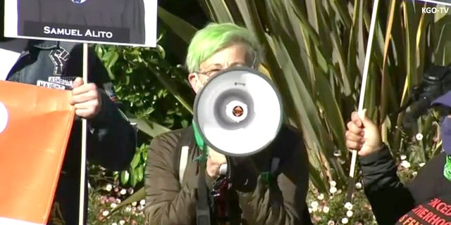 Pro-choice protester outside Nancy Pelosi's house. Credit KGO-TV. 