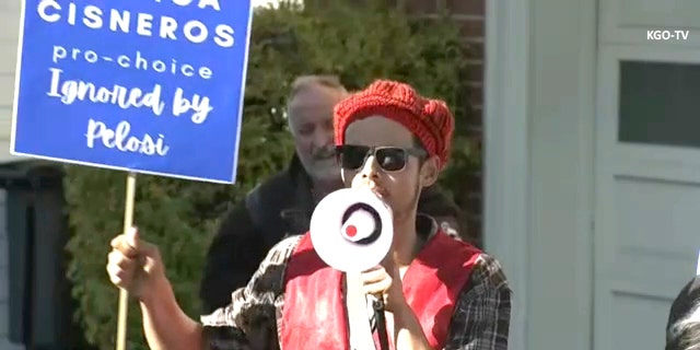 Pro-choice protester outside Nancy Pelosi's house. Credit KGO-TV. 