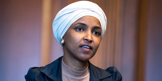 Rep. Ilhan Omar, D-Minn., is seen in the U.S. Capitols Rayburn Room during a group photo with the Congressional Black Caucus, on Wednesday, April 6, 2022. (Tom Williams/CQ-Roll Call, Inc via Getty Images)