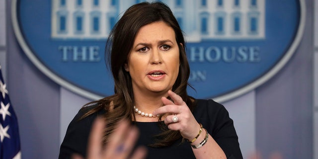 FILE - In this Monday, March 11, 2019, file photo, White House press secretary Sarah Sanders speaks during a news briefing at the White House, in Washington.
