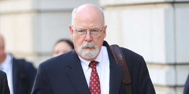 Special Counsel John Durham departs the U.S. federal courthouse after opening arguments in the trial of attorney Michael Sussmann in Washington, May 17, 2022.