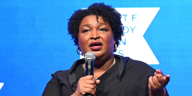 Stacey Abrams speaks onstage during the 2021 Robert F. Kennedy Human Rights Ripple of Hope Award Gala on Dec. 9, 2021, in New York City.