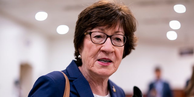 Sen. Susan Collins, R-Maine, speaks to reporters amid the fallout from a leaked draft Supreme Court opinion that could overturn the landmark Roe v. Wade ruling, at the Capitol in Washington, Wednesday, May 4, 2022. 