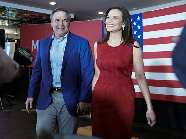 Republican candidate for U.S. Senate in Pennsylvania, Dave McCormick and his wife Dina Powell greet supporters as they arrive for his returns watch party in the Pennsylvania primary election, Tuesday, May 17, 2022, in Pittsburgh. (AP Photo/Keith Srakocic)