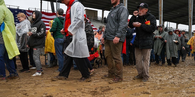 Trump supporters are seen as former President Donald Trump held a "Save America" rally despite the heavy rain and muddy field in Greensburg, Pennsylvania, May 6, 2022.
