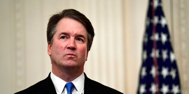 In this Oct. 8, 2018, file photo, Supreme Court Justice Brett Kavanaugh stands before a ceremonial swearing-in in the East Room of the White House in Washington. 