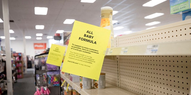 Empty shelves show a shortage of baby formula at a CVS store in San Antonio, Texas.