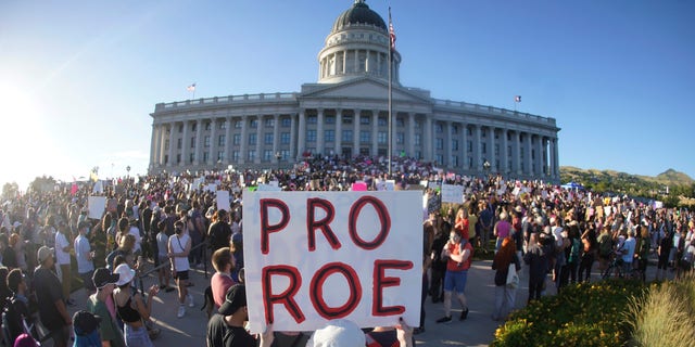 People attend an abortion-rights protest at the Utah State Capitol in Salt Lake City after the Supreme Court overturned Roe v. Wade, Friday, June 24, 2022. 