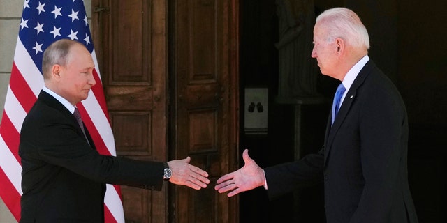 FILE - President Joe Biden and Russian President Vladimir Putin, arrive to meet at the 'Villa la Grange', in Geneva, Switzerland, June 16, 2021. (AP Photo/Alexander Zemlianichenko, File Pool)