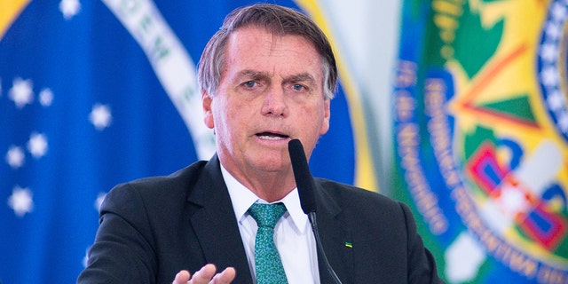 President Jair Bolsonaro speaks during a press conference on International Day Against Corruption at Planalto Palace on December 9, 2021 in Brasilia, Brazil. 