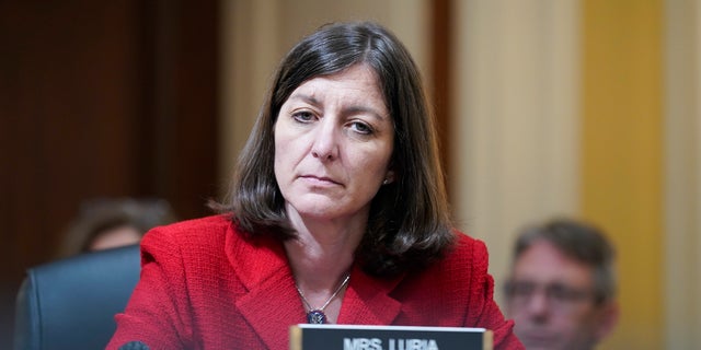 Rep. Elaine Luria listens as the House select committee investigating the Jan. 6 attack on the U.S. Capitol holds its first public hearing on Capitol Hill, June 9, 2022, in Washington.