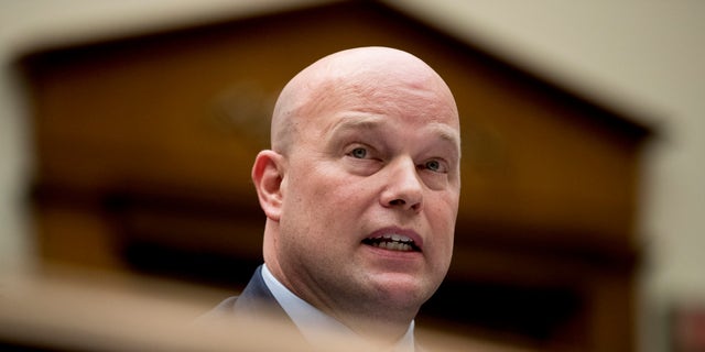 FILE - In this Feb. 8, 2019 file photo , then Acting Attorney General Matthew Whitaker speaks during a House Judiciary Committee hearing on Capitol Hill in Washington. Whitaker has left the Justice Department. (AP Photo/Andrew Harnik)