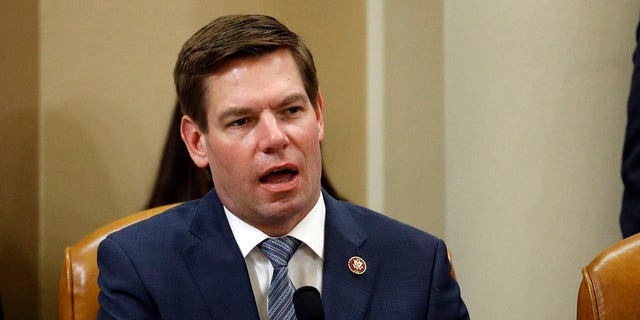 Rep. Eric Swalwell, D-Calf., votes to approve the second article of impeachment against President Donald Trump during a House Judiciary Committee meeting, Friday, Dec. 13, 2019, on Capitol Hill in Washington.