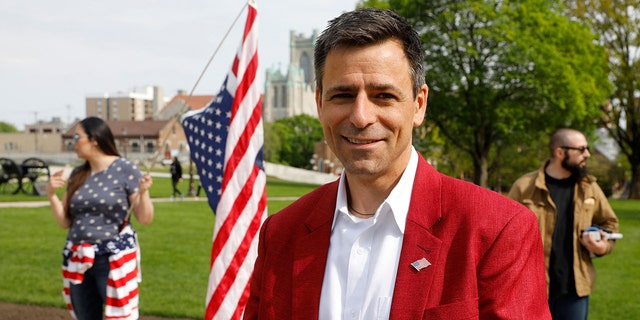 Ryan Kelly, Republication candidate for Governor, attends a Freedom Rally in support of First Amendment rights and to protest against Governor Gretchen Whitmer, outside the Michigan State Capitol in Lansing, Michigan on May 15, 2021. 