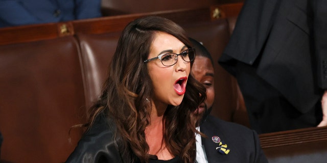 Rep. Lauren Boebert, R-Colo., screams "Build the Wall" as President Joe Biden delivers his first State of the Union address to a joint session of Congress at the Capitol, Tuesday, March 1, 2022, in Washington. (Evelyn Hockstein/Pool via AP)
