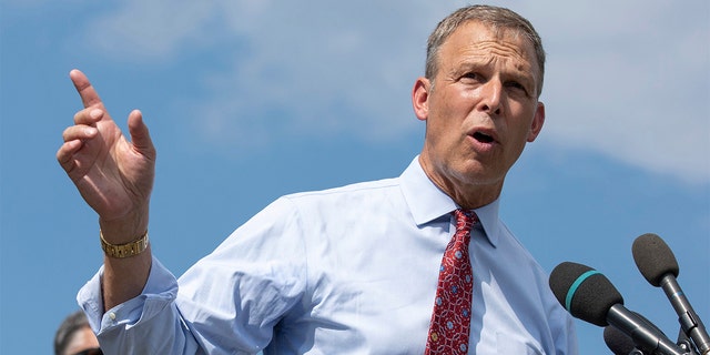 FILE - Rep. Scott Perry, R-Pa., takes a question from a reporter at a news conference held by the House Freedom Caucus on Capitol Hill in Washington, on Aug. 23, 2021. 