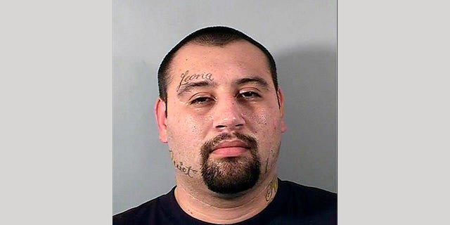 This photo provided by the California Department of Corrections and Rehabilitation shows Justin William Flores who is the alleged gunman in a Southern California shootout that killed two police officers on Tuesday, June 14, 2022 in El Monte, Calif. Flores was identified as the suspect by the Los Angeles County District Attorney's Office on Wednesday, June 15, 2022. 