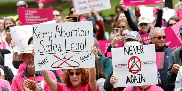 People rally in support of abortion rights at the state Capitol in Sacramento, Calif., in May 2019. A proposed amendment to the state constitution that would protect the right to an abortion and contraceptives was approved by the state Senate Monday. 