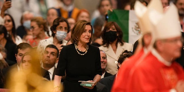 Speaker of the House Nancy Pelosi, D-Calif., looks at Pope Francis as he celebrates a Mass on the Solemnity of Saints Peter and Paul, in St. Peter's Basilica at the Vatican, Wednesday, June 29, 2022. (AP Photo/Alessandra Tarantino)