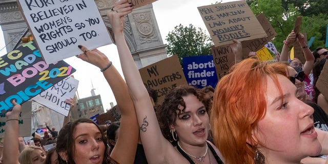Pro-choice protestors carry signs in New York City following a Supreme Court decision to overturn Roe v. Wade. (Credit: John Mantel for Fox News Digital)